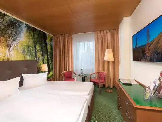 Een kamer bij AHORN Waldhotel Altenberg Een kamer bij AHORN Waldhotel Altenberg