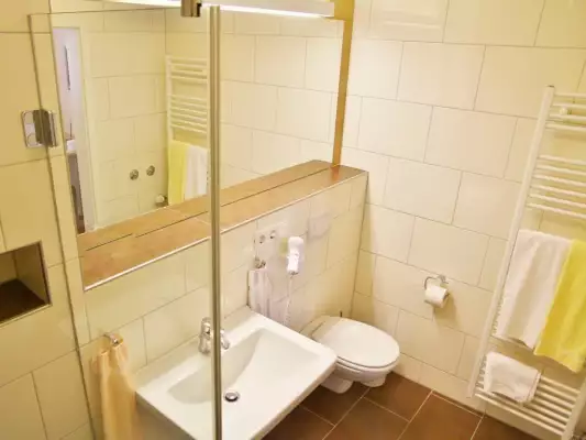 Het sanitair van een kamer