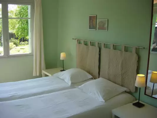 De slaapkamer van Gite De slaapkamer van Gite